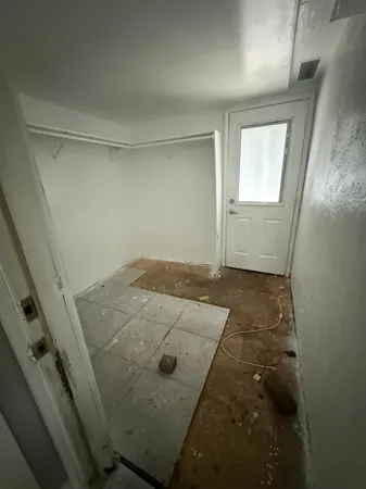 an empty room with windows
