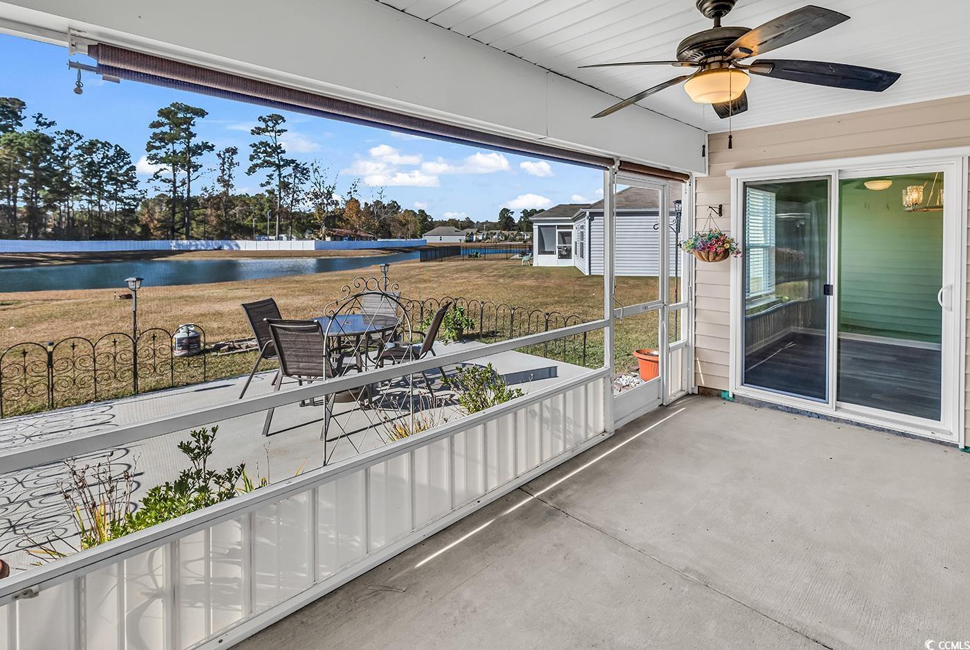 623 Burnt Ash Drive Longs, SC 29568 - Photo 22 of 35 View of patio featuring ceiling fan and a sunroom