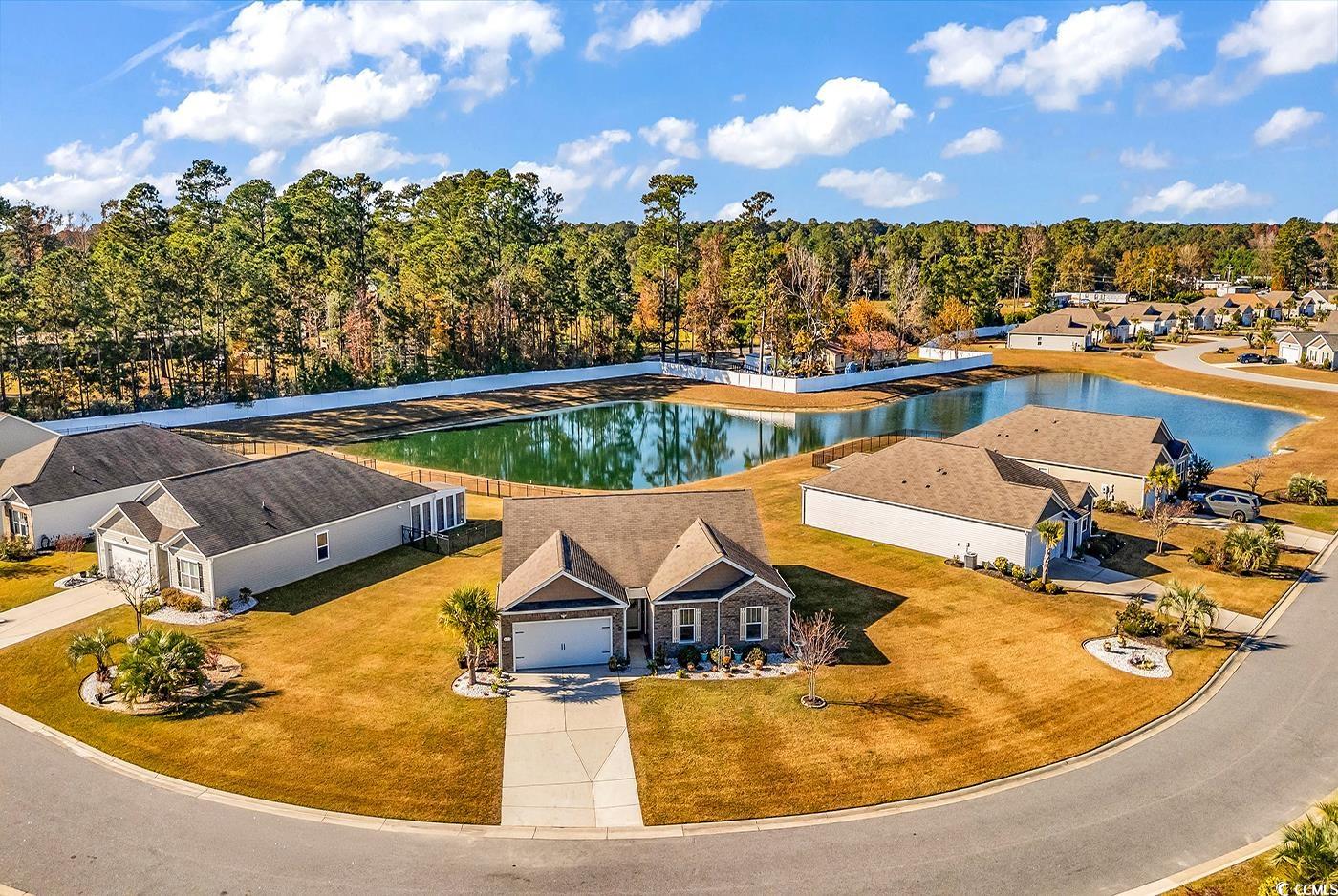 623 Burnt Ash Drive Longs, SC 29568 - Photo 30 of 35 Aerial view of residential area with a nearby body of water