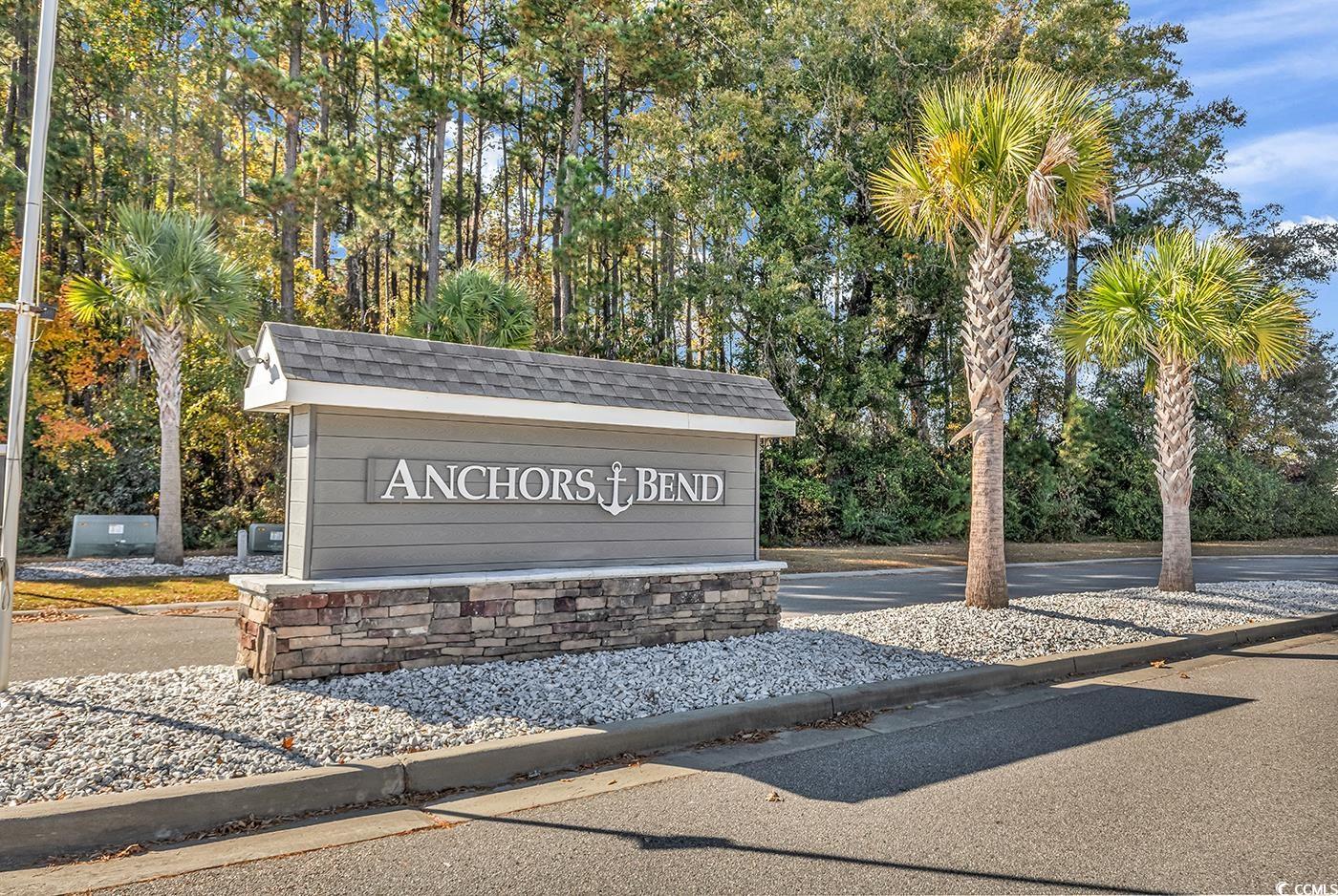 623 Burnt Ash Drive Longs, SC 29568 - Photo 32 of 35 Aerial view of residential area with a nearby body of water and a heavily wooded area