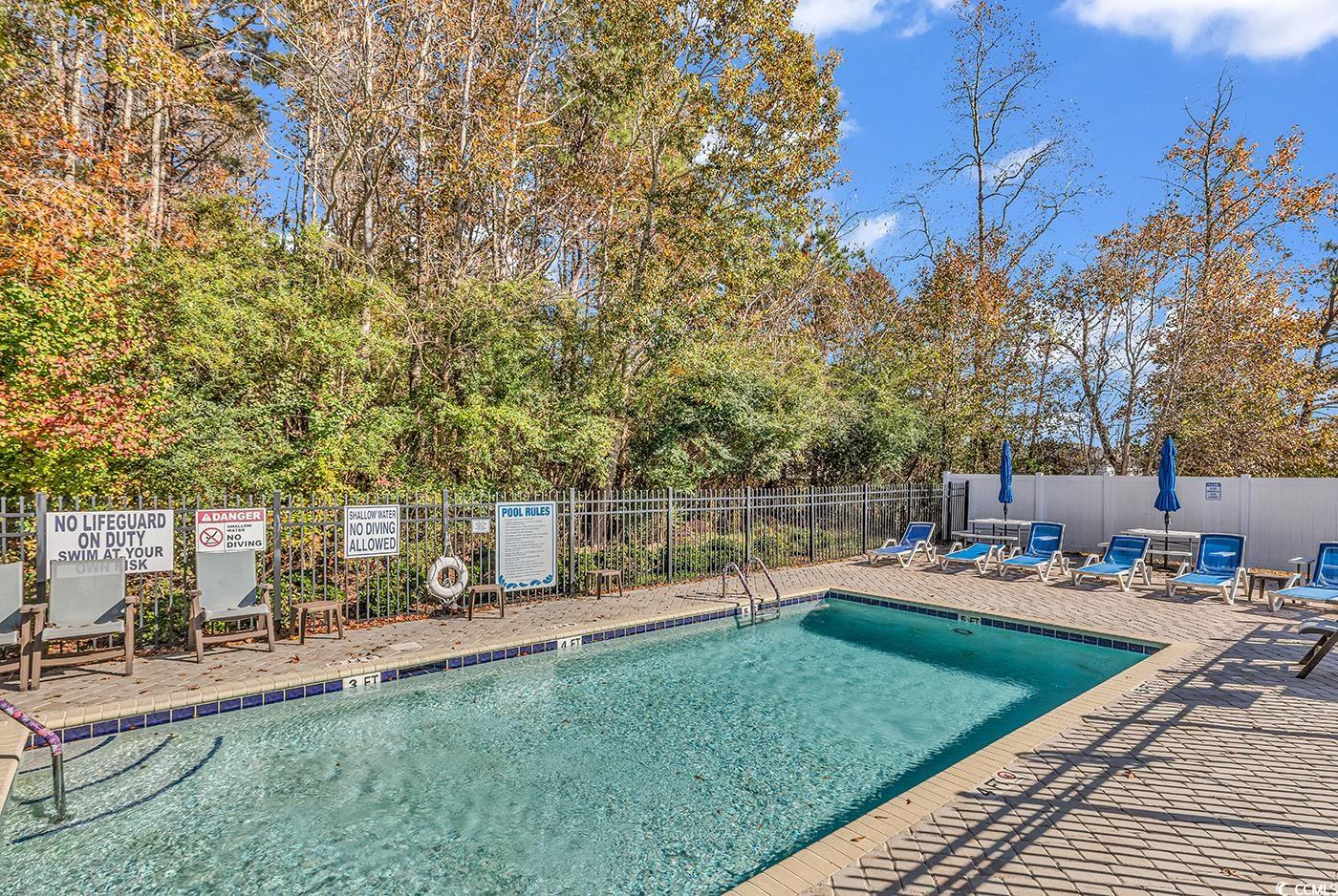 623 Burnt Ash Drive Longs, SC 29568 - Photo 33 of 35 Community sign with view of scattered trees