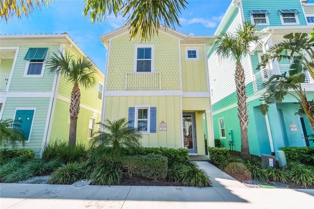 8008 Sandy Toes Way Kissimmee, FL 34747 - Photo 1 of 21 a front view of a house with a yard