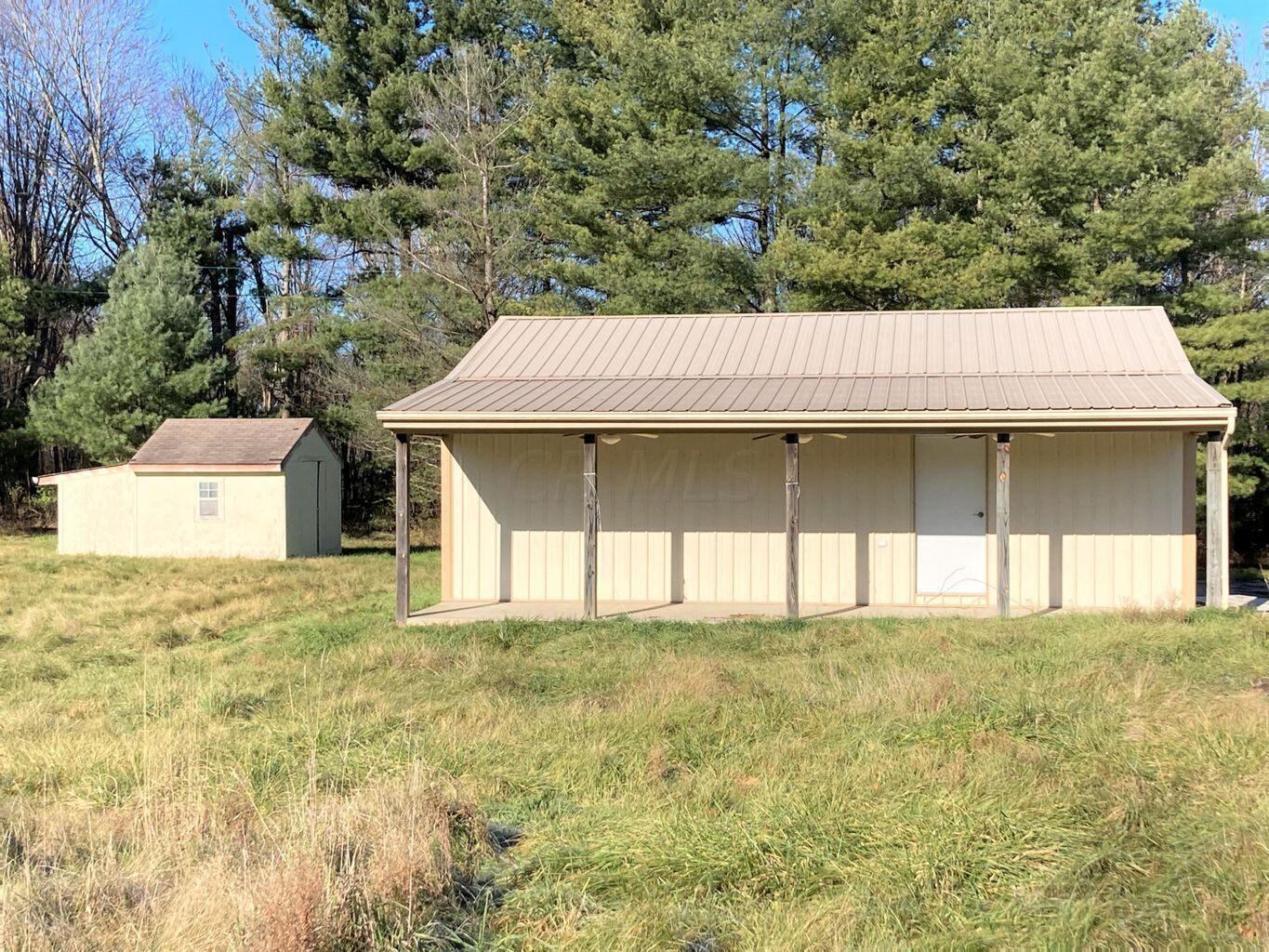Side porch of garage.
