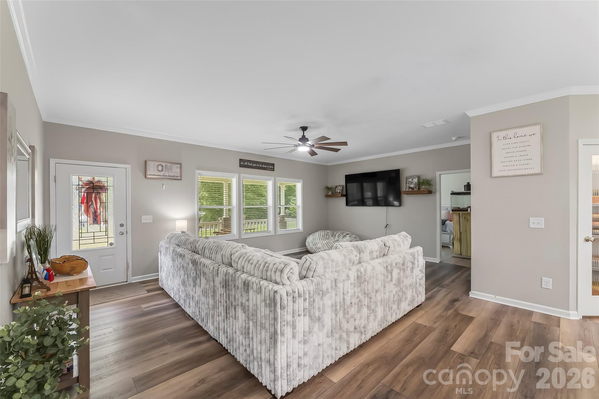 3511 Randleman Road Iron Station, NC 28080 - Photo 6 of 31 a bed room with a bed and a couch