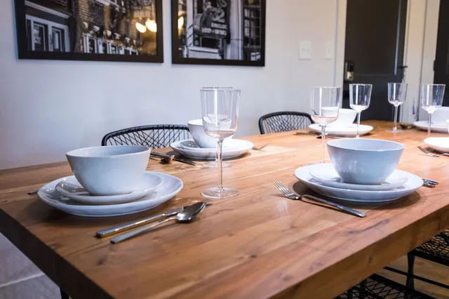 a bedroom with a bed and a television