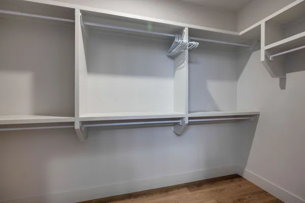 a room with gym equipment and a large window