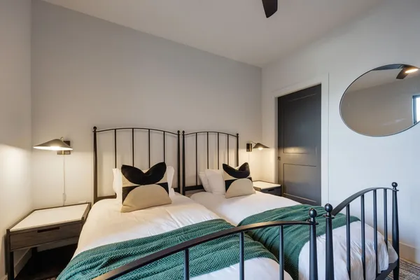 an aerial view of residential houses with city view