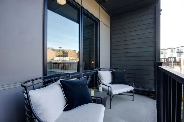 a view of a patio with swimming pool
