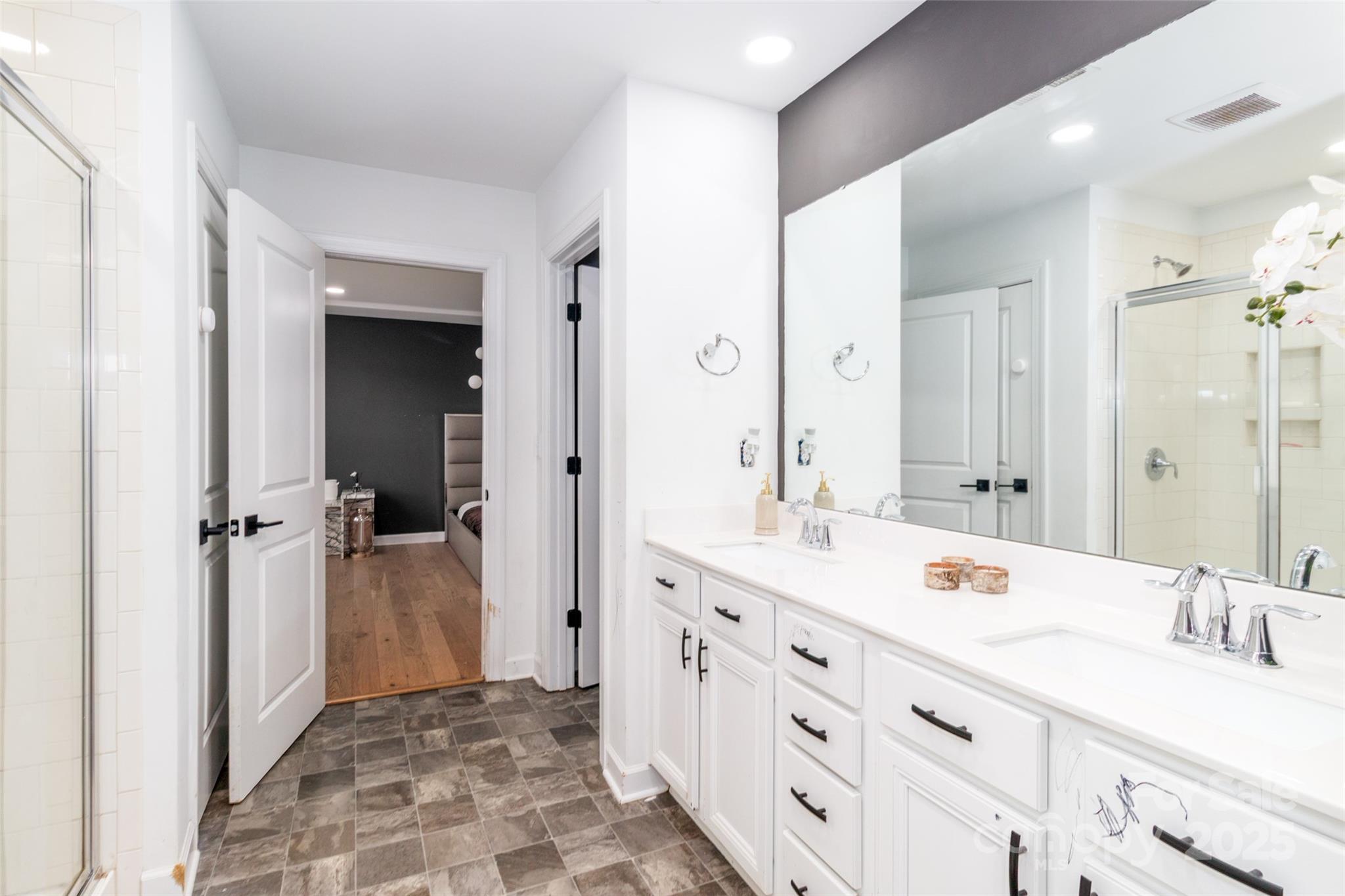4314 Collingham Drive Charlotte, NC 28273 - Photo 23 of 46 a spacious bathroom with a double vanity sink mirror and double