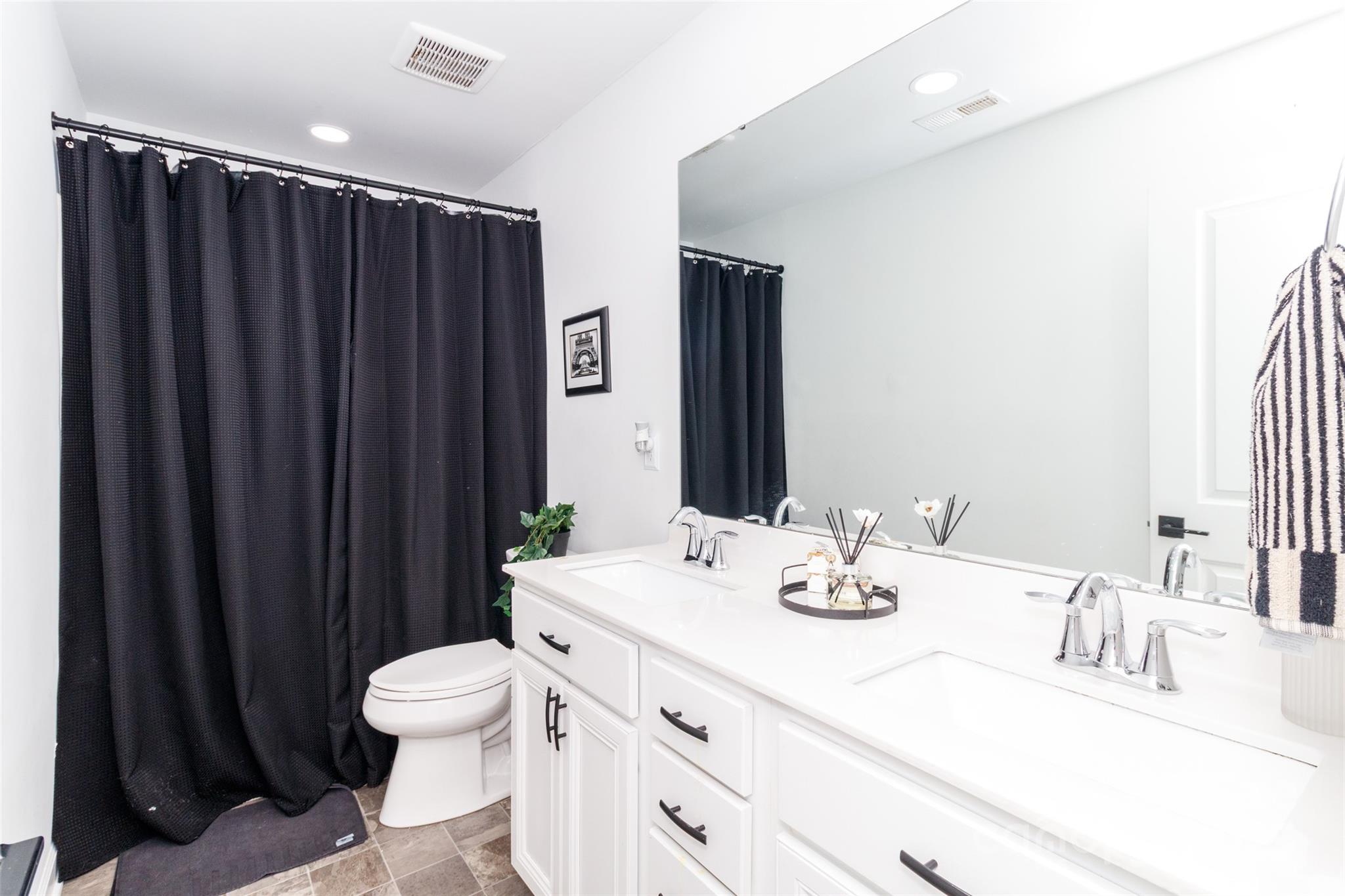 4314 Collingham Drive Charlotte, NC 28273 - Photo 30 of 46 a bathroom with a sink and a mirror