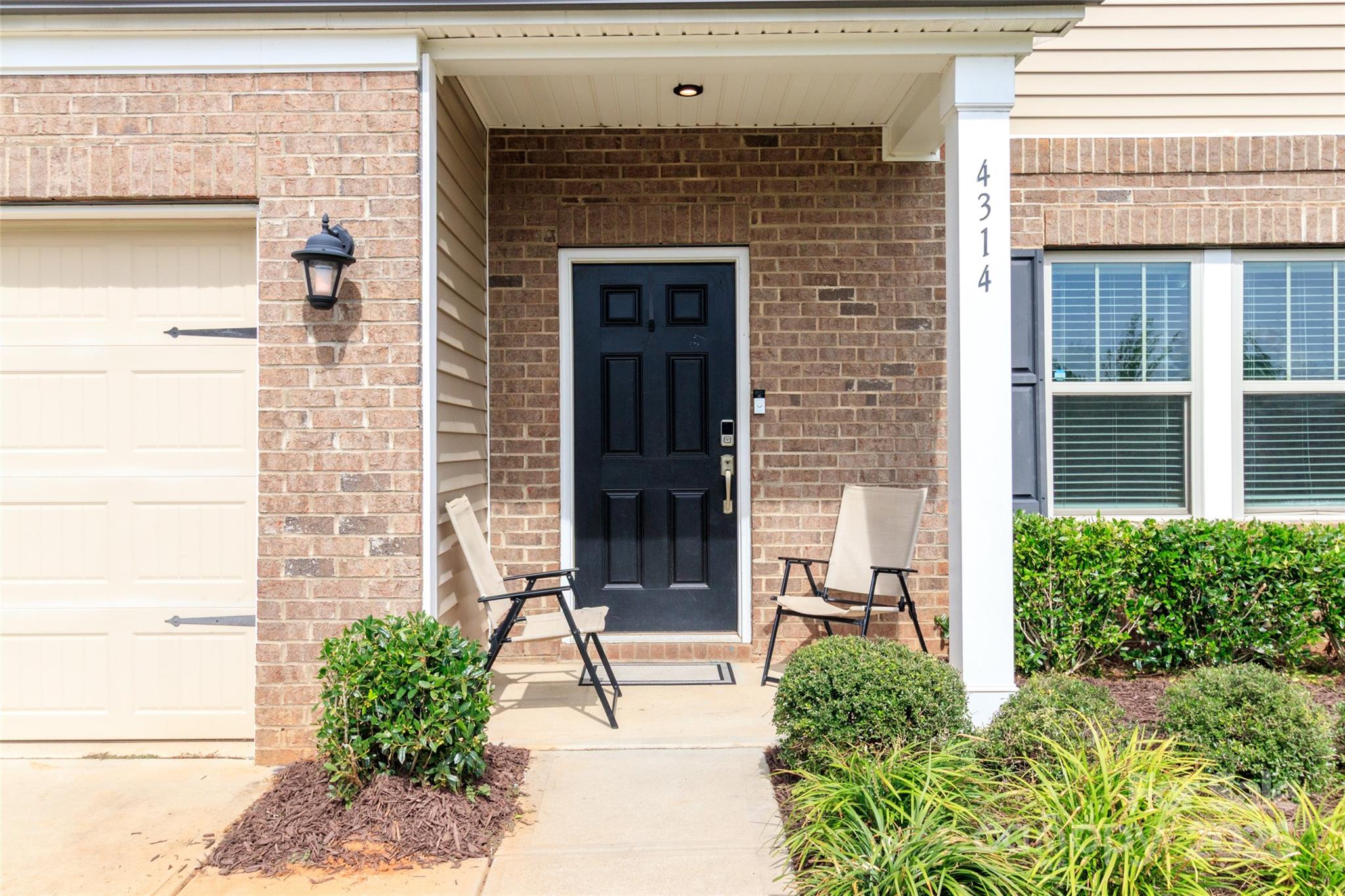 4314 Collingham Drive Charlotte, NC 28273 - Photo 3 of 46 a front view of a house with a yard