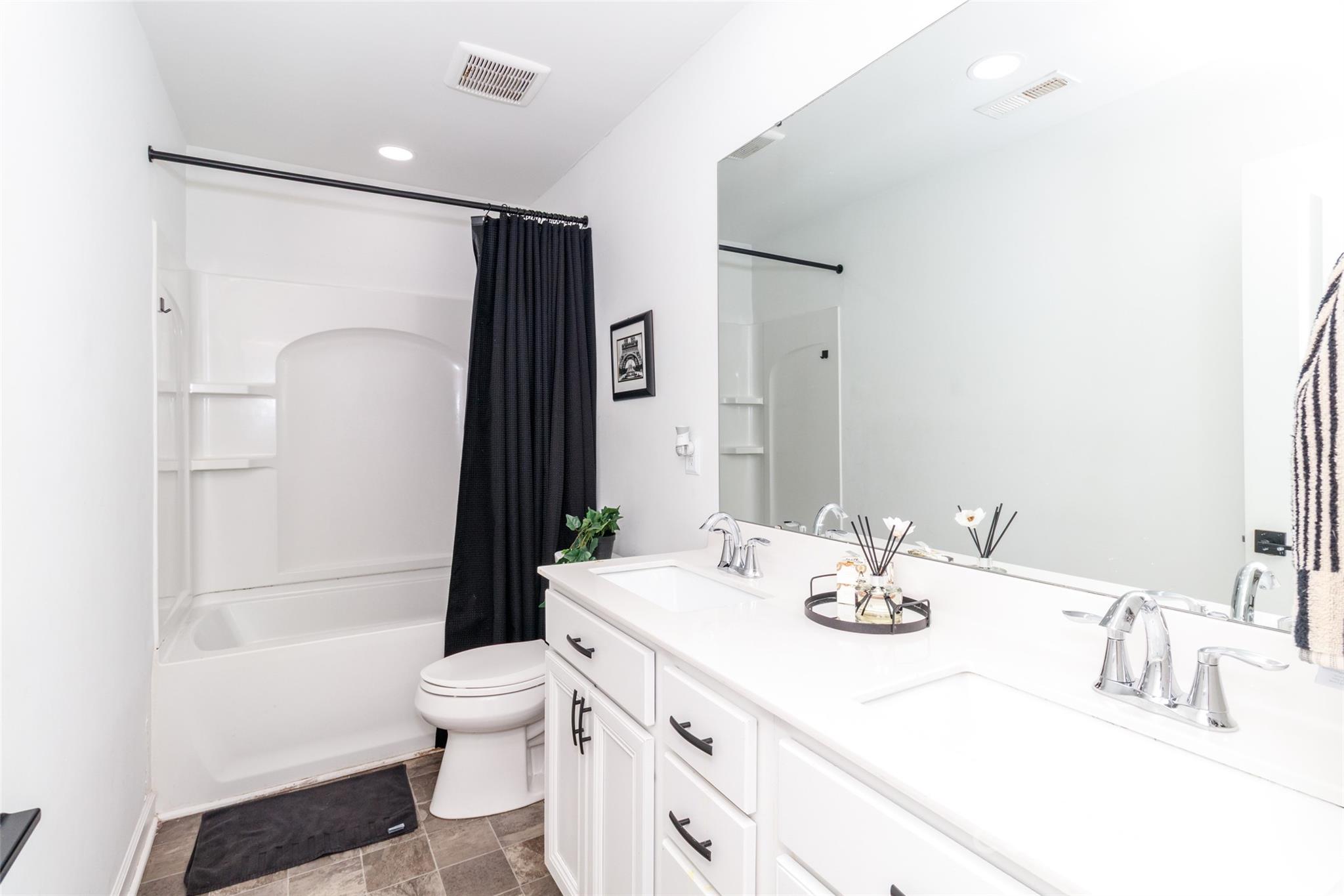 4314 Collingham Drive Charlotte, NC 28273 - Photo 31 of 46 a bathroom with a granite countertop sink toilet and shower