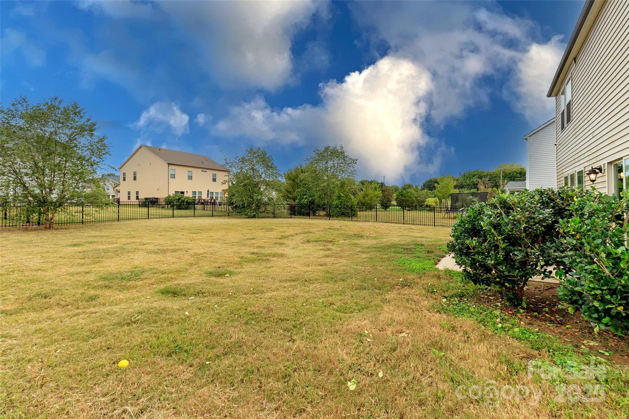 4314 Collingham Drive Charlotte, NC 28273 - Photo 35 of 46 a view of a lake with sunset