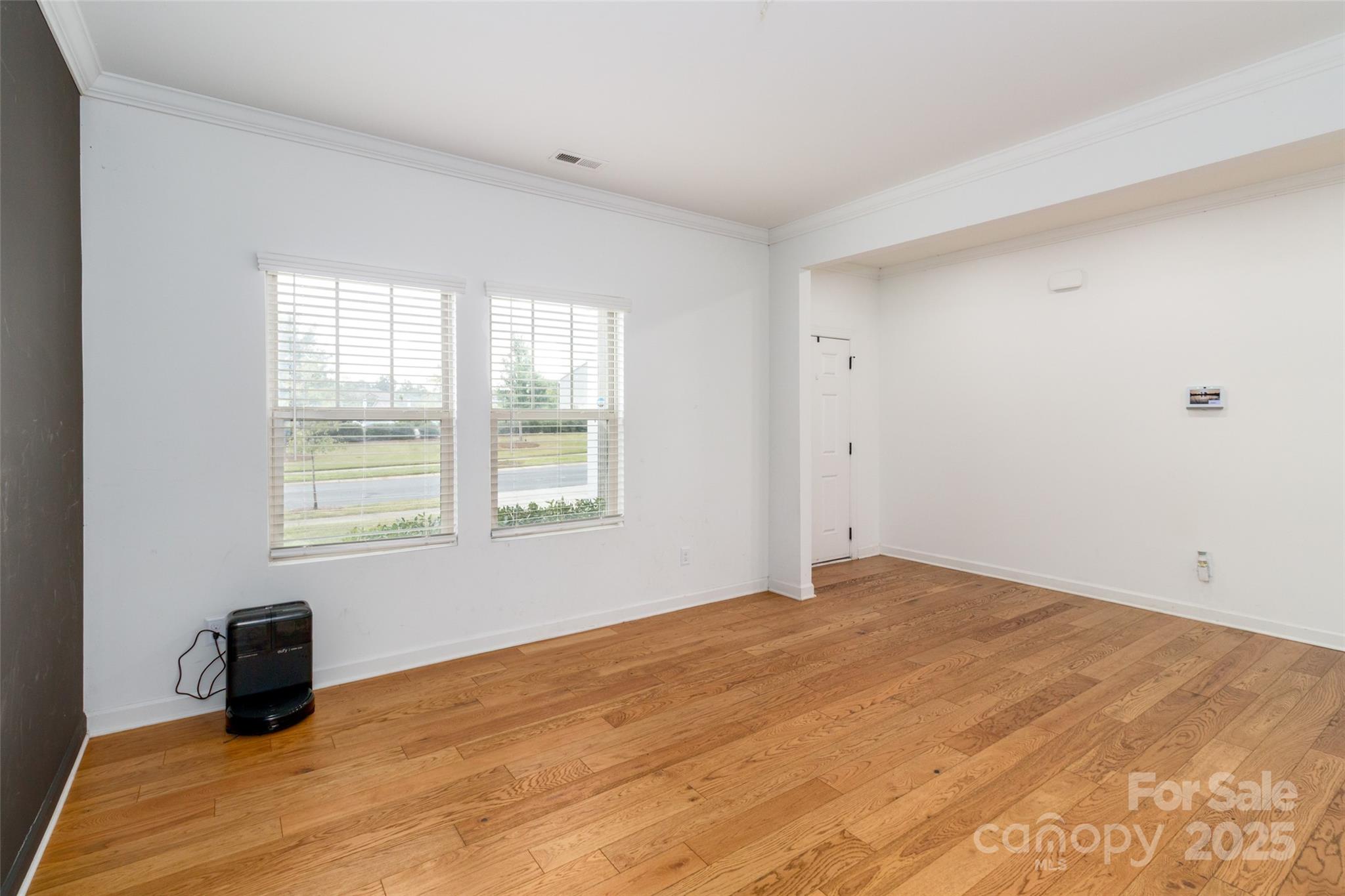 4314 Collingham Drive Charlotte, NC 28273 - Photo 10 of 46 a view of an empty room with a window
