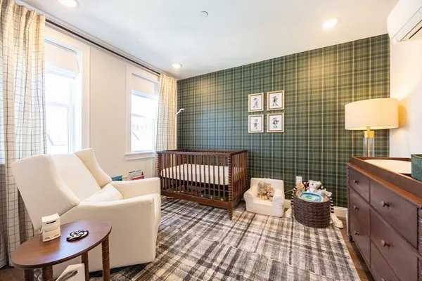 a bathroom with a sink toilet a mirror and shower
