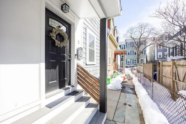 a front view of a building with many windows