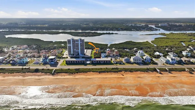 a view of a city with an ocean