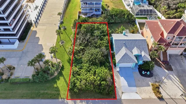 an aerial view of house with yard swimming pool and outdoor seating