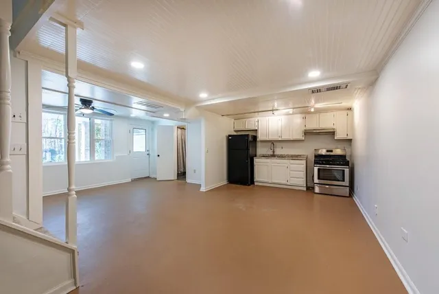 a backyard of a house with lots of green space