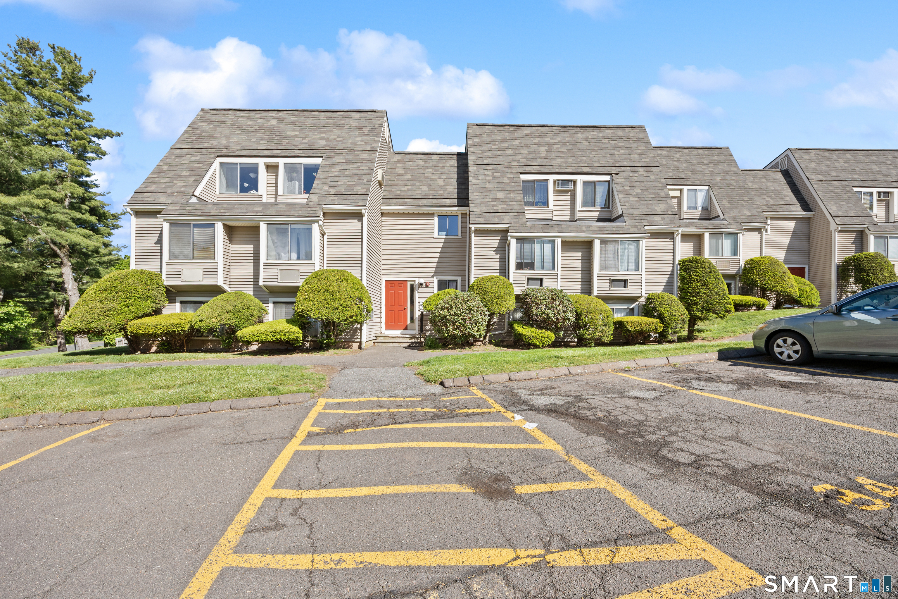560 Yale Avenue, Unit 82 Meriden, CT 06450 - Photo 1 of 22 a front view of a house with garden