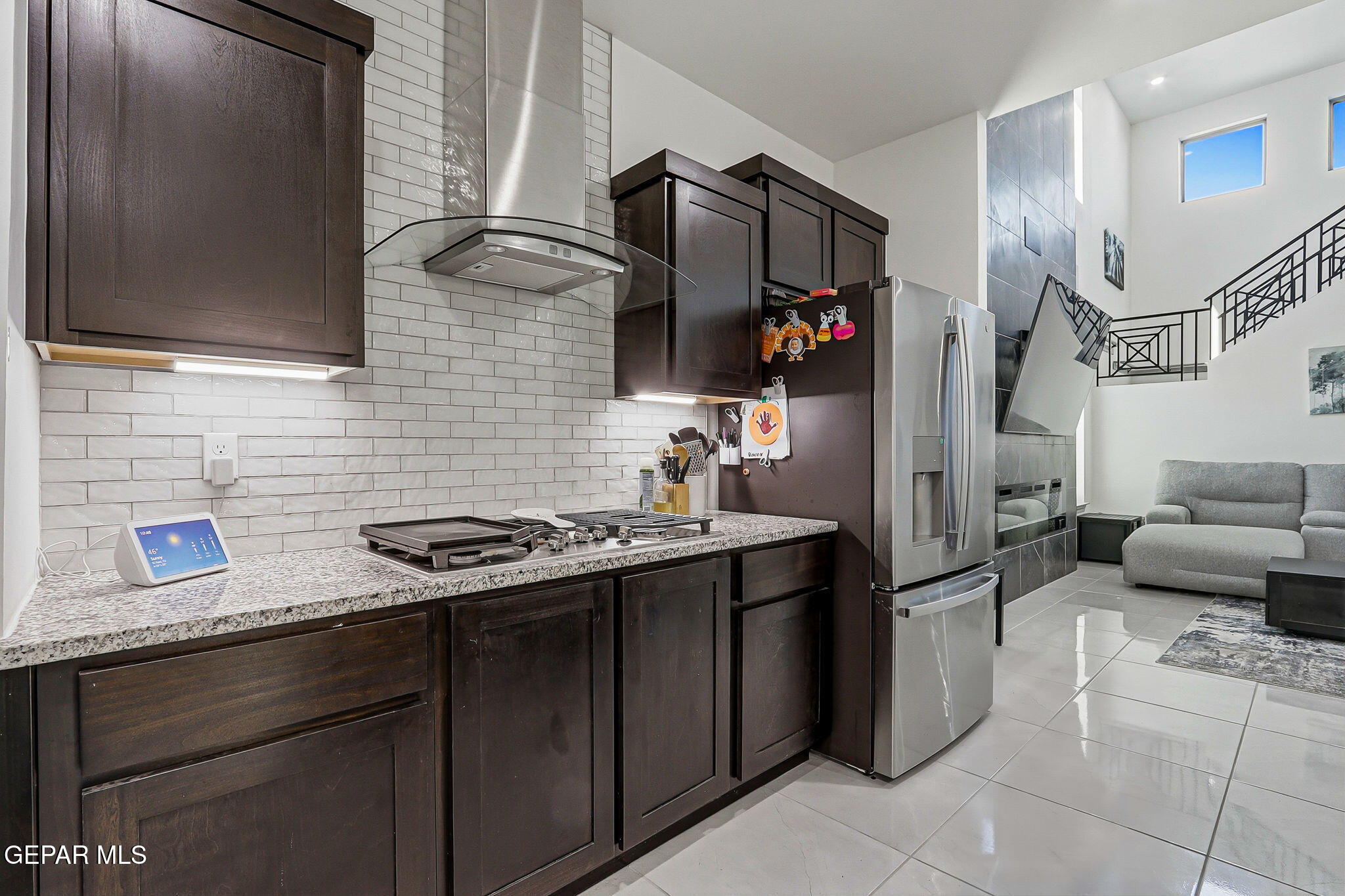 12892 Jonathan Raul El Paso, TX 79928 - Photo 13 of 53 a kitchen with stainless steel appliances granite countertop a sink stove and refrigerator