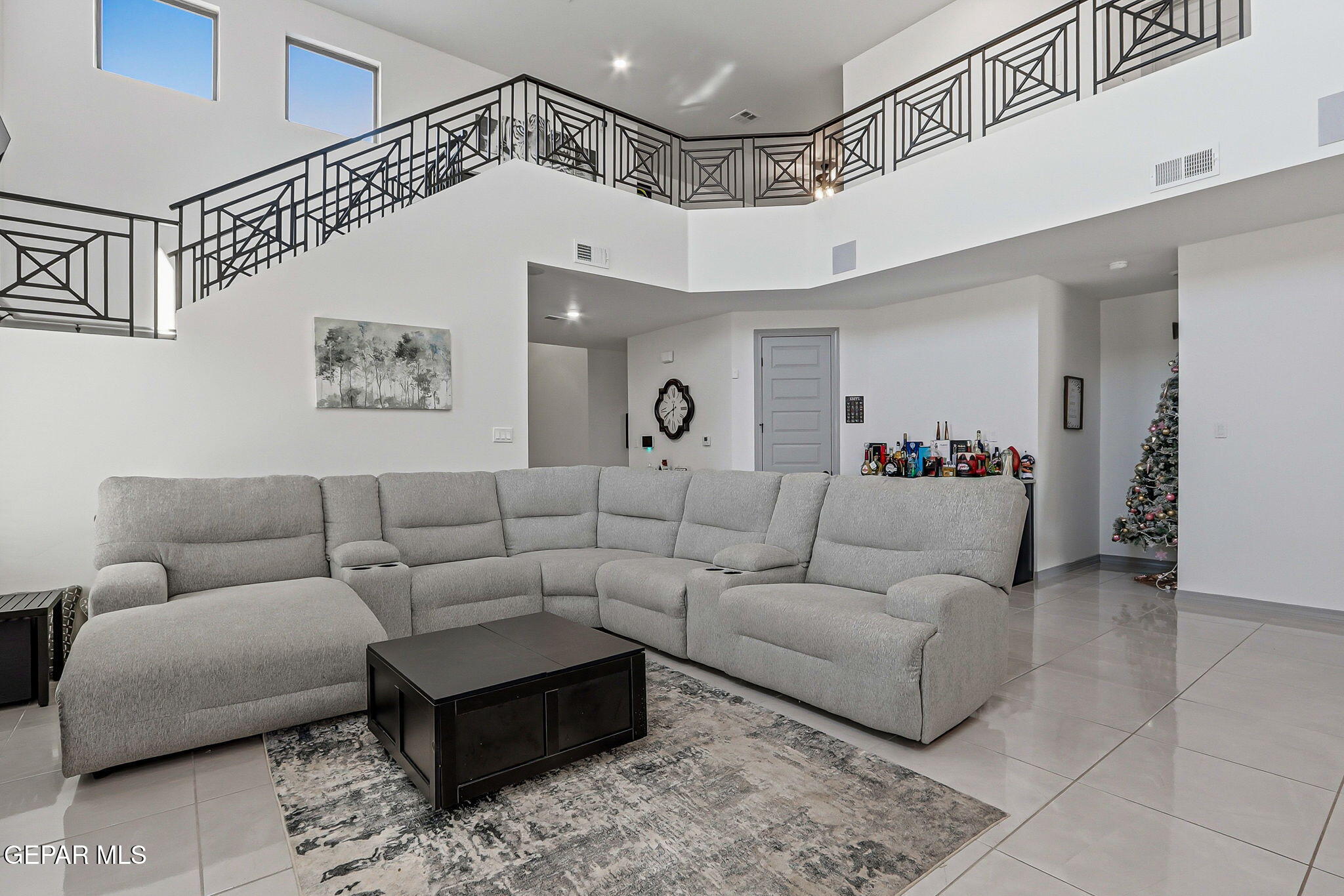12892 Jonathan Raul El Paso, TX 79928 - Photo 15 of 53 a living room with furniture and a chandelier