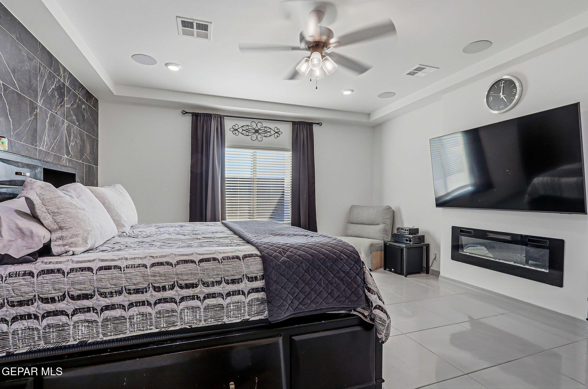 12892 Jonathan Raul El Paso, TX 79928 - Photo 24 of 53 a bedroom with a bed and a television