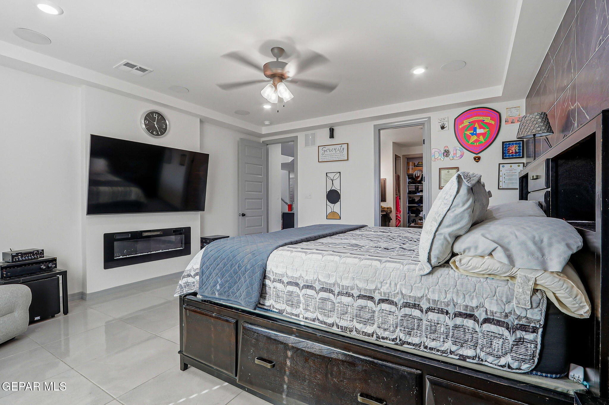 12892 Jonathan Raul El Paso, TX 79928 - Photo 27 of 53 a bedroom with a bed and a flat screen tv