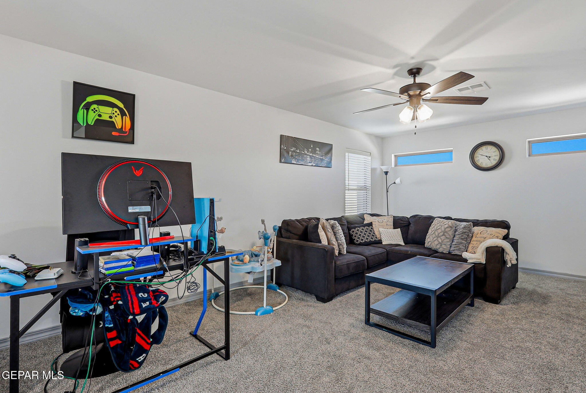 12892 Jonathan Raul El Paso, TX 79928 - Photo 37 of 53 a living room with lots of furniture and a ceiling fan