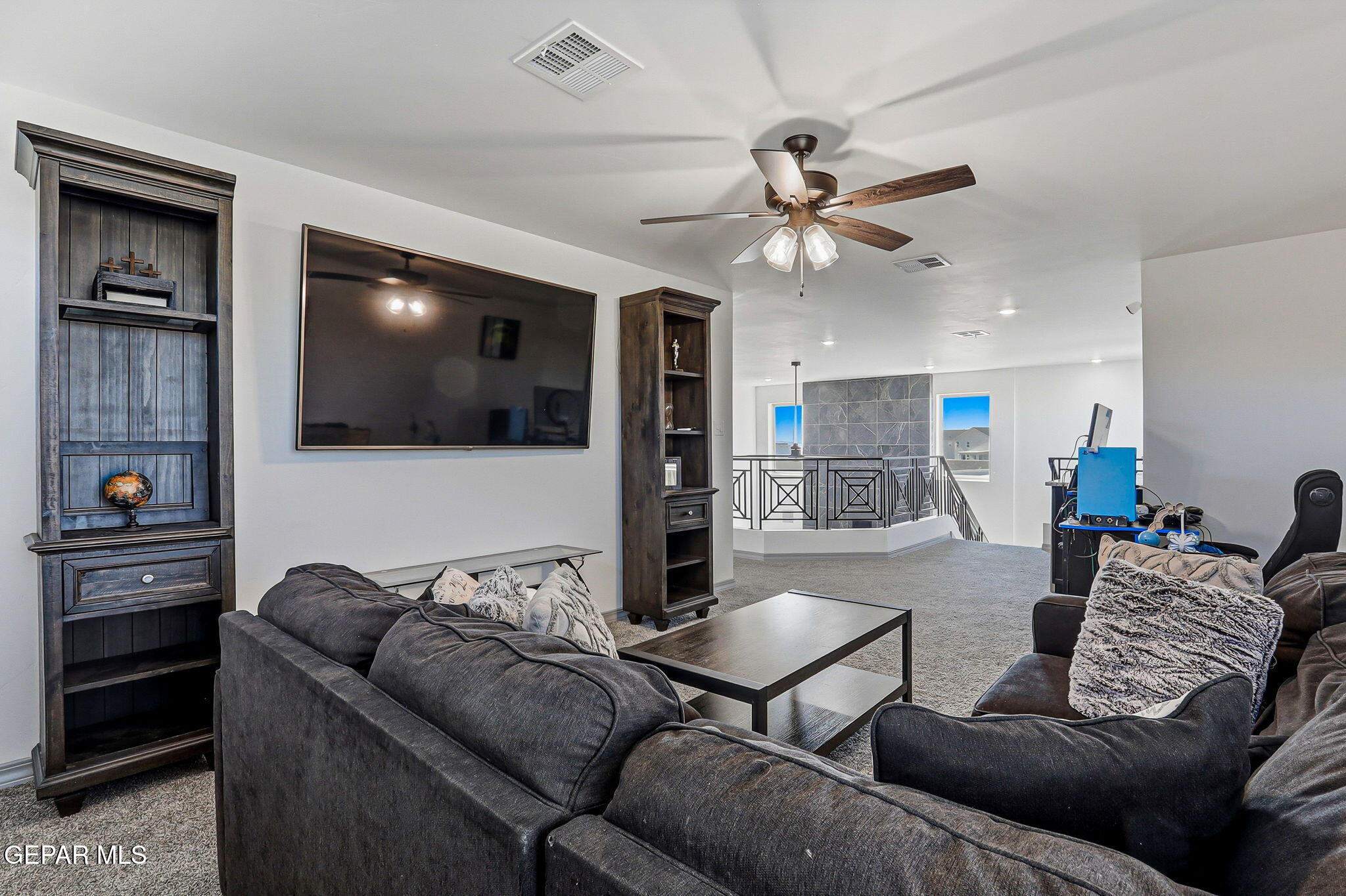 12892 Jonathan Raul El Paso, TX 79928 - Photo 41 of 53 a living room with furniture and a flat screen tv