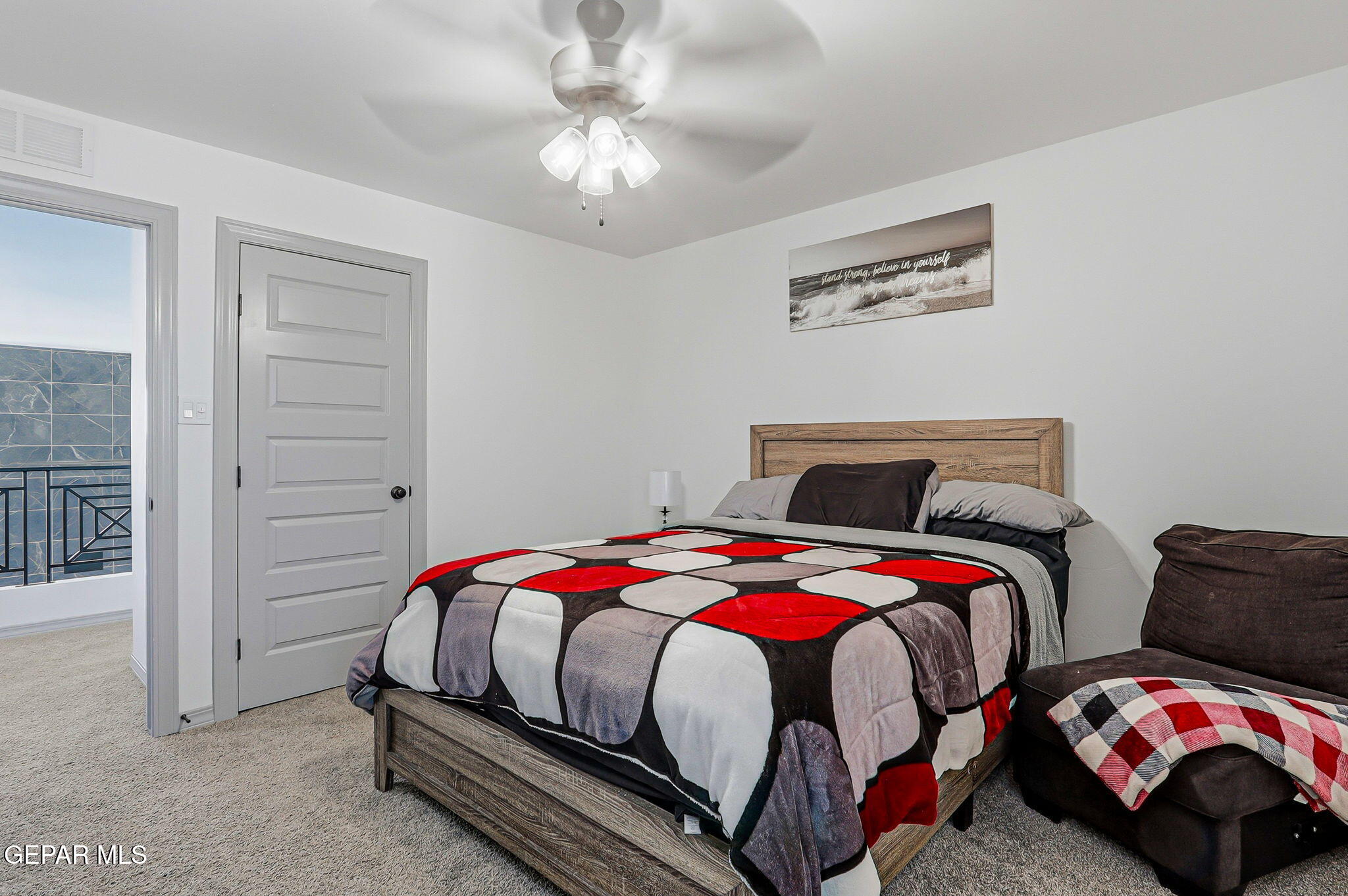 12892 Jonathan Raul El Paso, TX 79928 - Photo 43 of 53 a bedroom with a bed and a chandelier