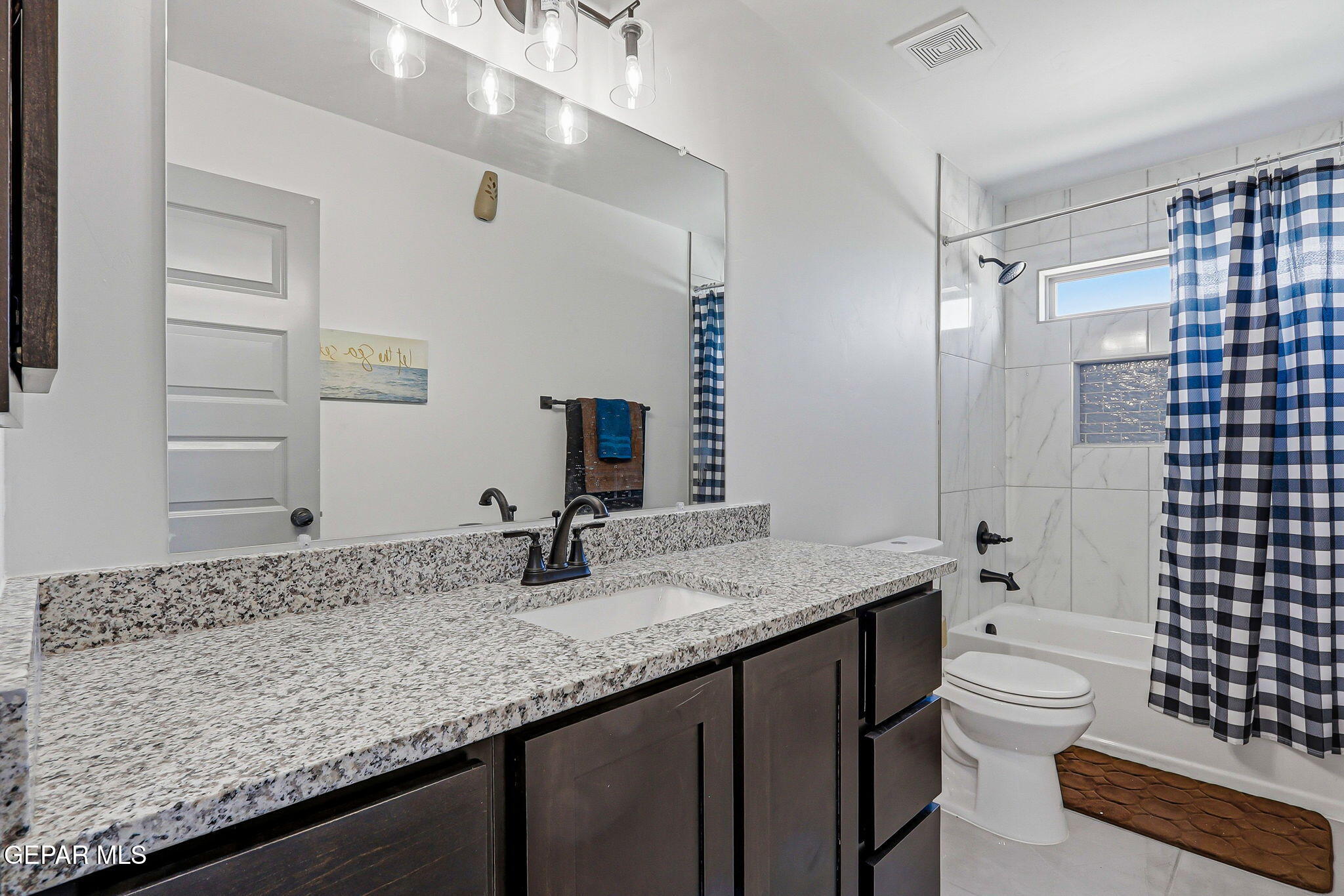 12892 Jonathan Raul El Paso, TX 79928 - Photo 44 of 53 a bathroom with a granite countertop double vanity sink toilet and shower