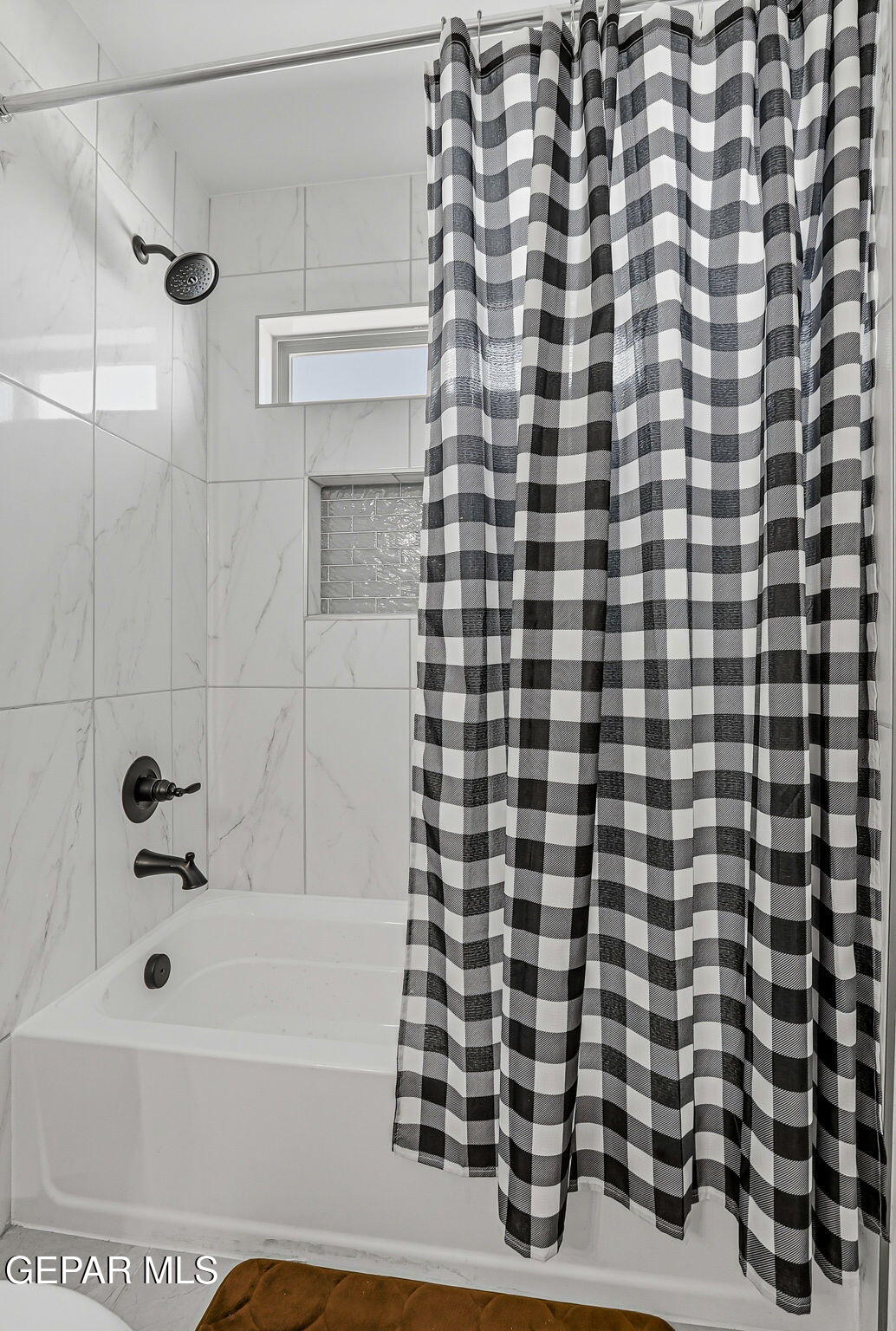 12892 Jonathan Raul El Paso, TX 79928 - Photo 45 of 53 a bathroom with a bathtub and shower