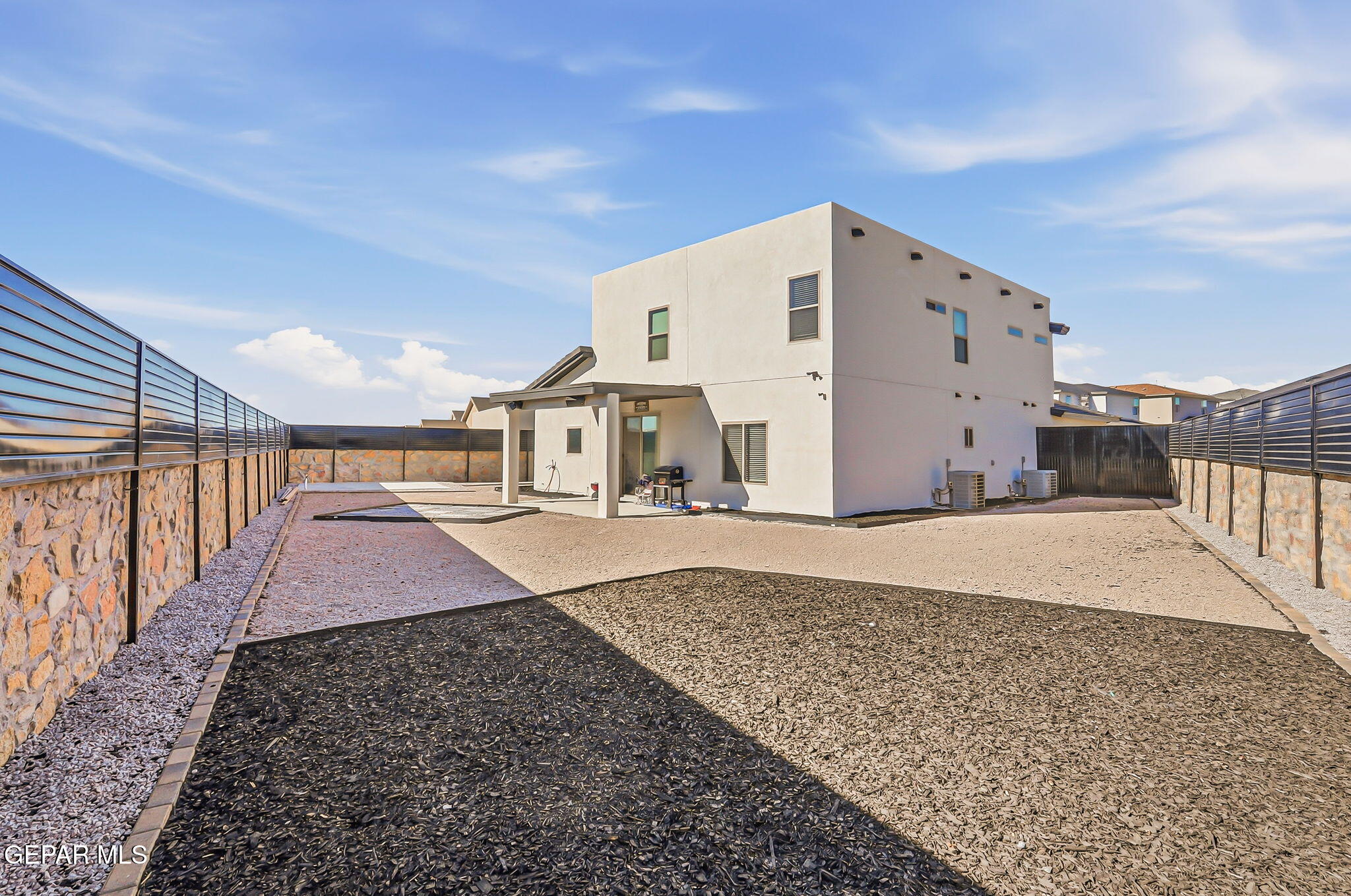 12892 Jonathan Raul El Paso, TX 79928 - Photo 50 of 53 a spacious bathroom with a granite countertop sink a mirror and shower