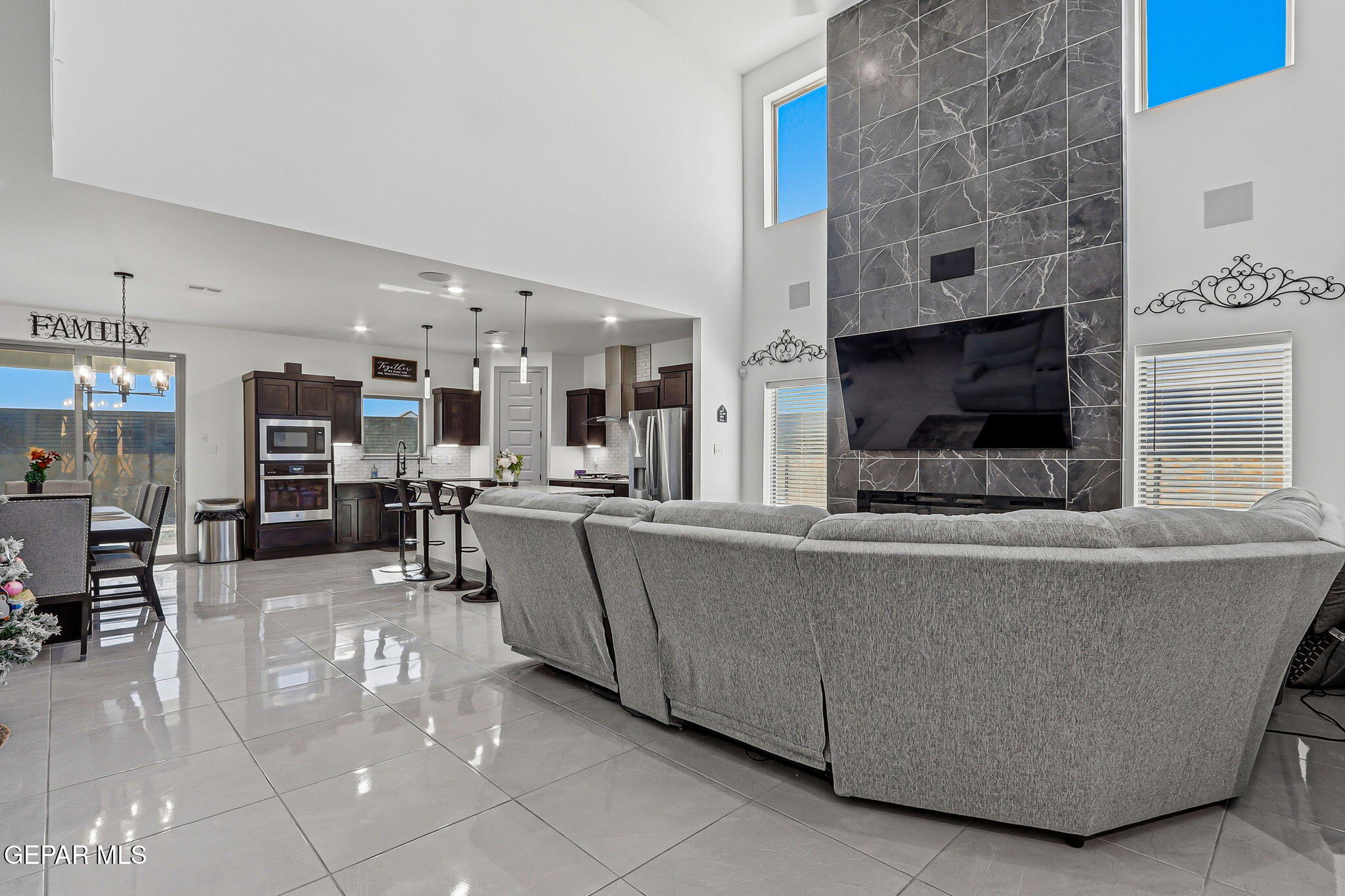 12892 Jonathan Raul El Paso, TX 79928 - Photo 6 of 53 a living room with furniture and a flat screen tv
