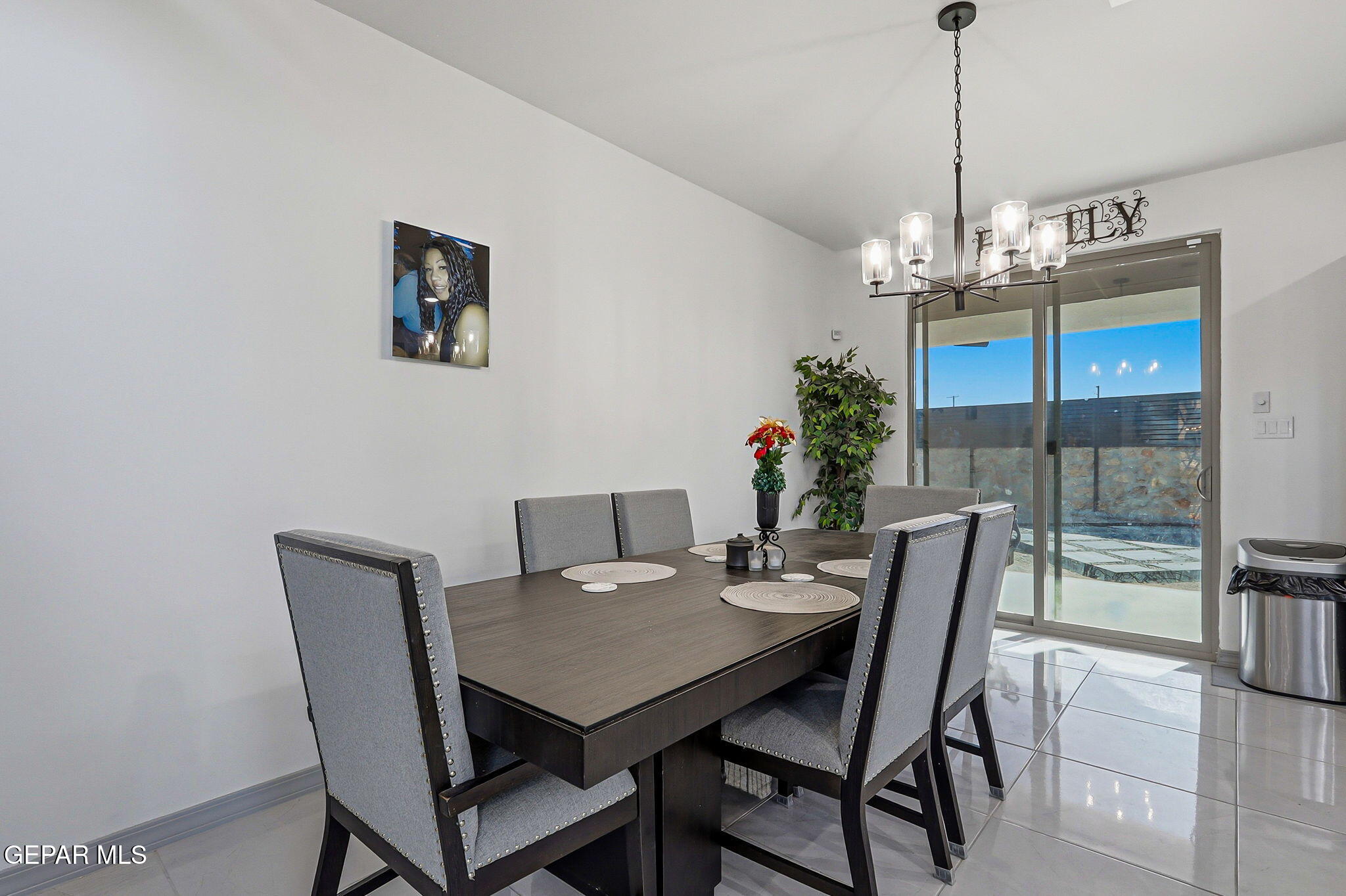 12892 Jonathan Raul El Paso, TX 79928 - Photo 10 of 53 a view of a dining room with furniture window and wooden floor
