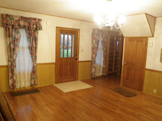 1449 North 32nd Road Ottawa, IL 61350 - Photo 3 of 21 a view of a bathroom with a shower curtain