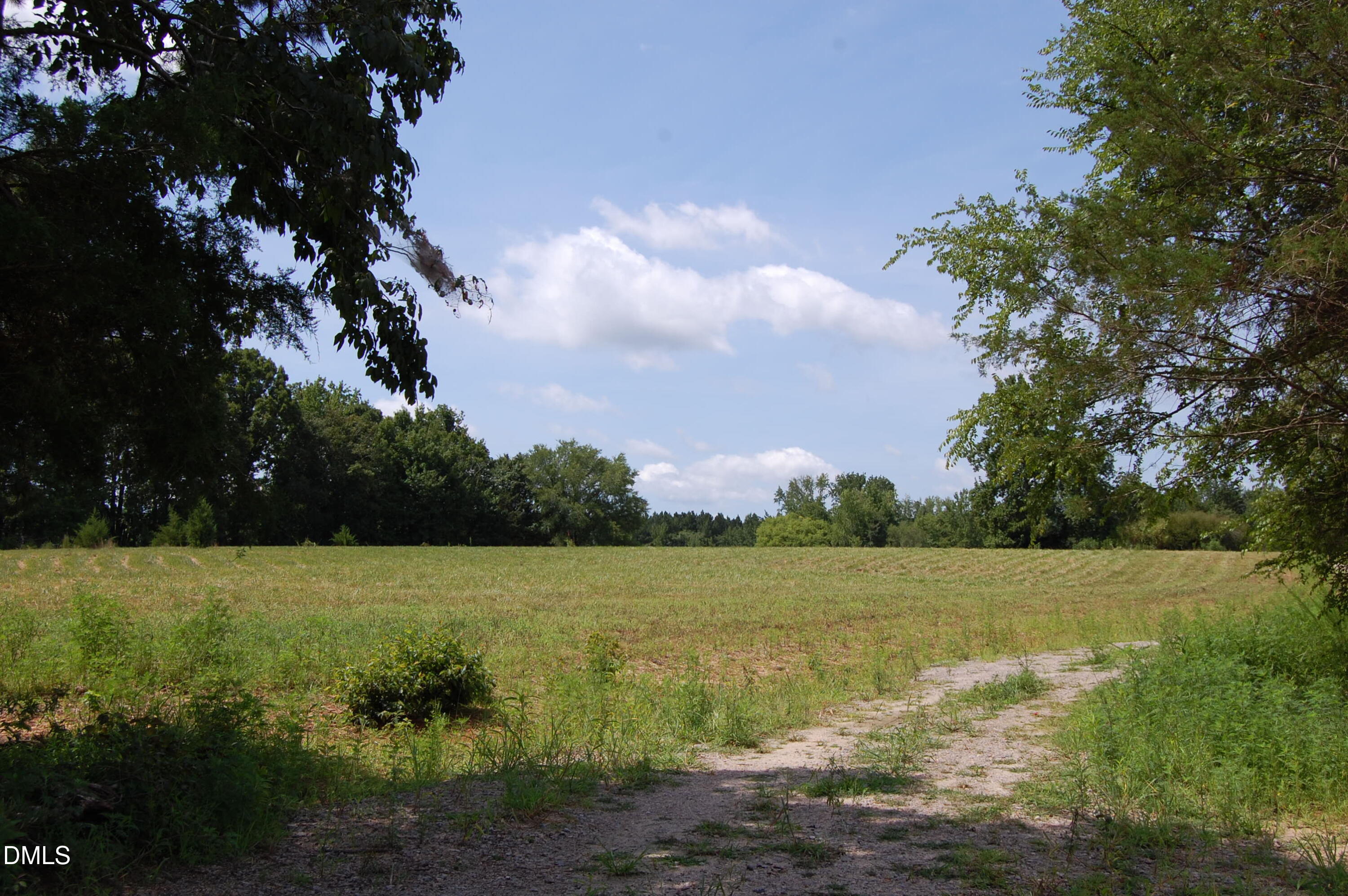 1 Keeton Road Bullock, NC 27507 - Photo 2 of 6 a view of a field with an ocean