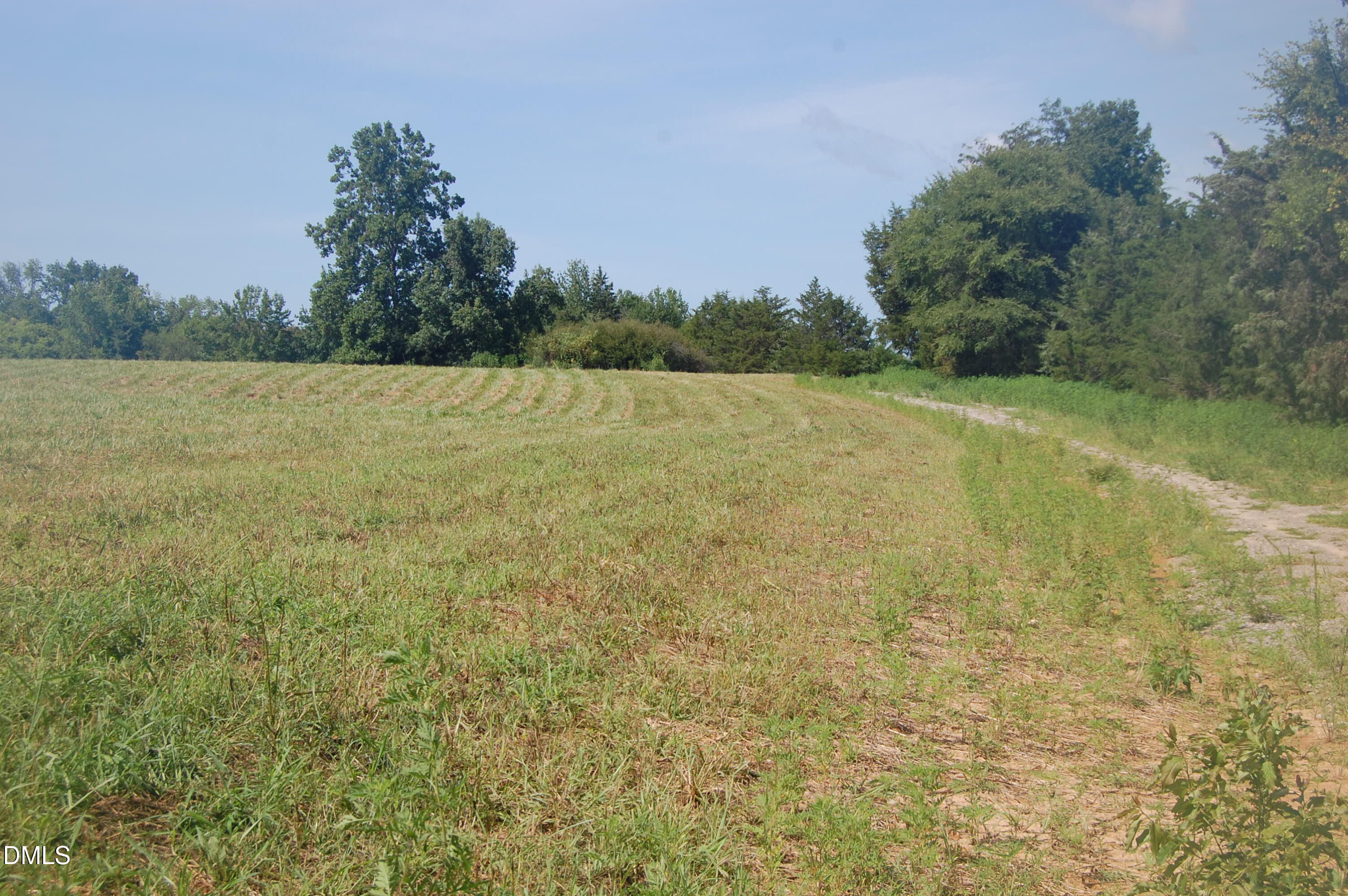 1 Keeton Road Bullock, NC 27507 - Photo 4 of 6 a view of a field with an outdoor space