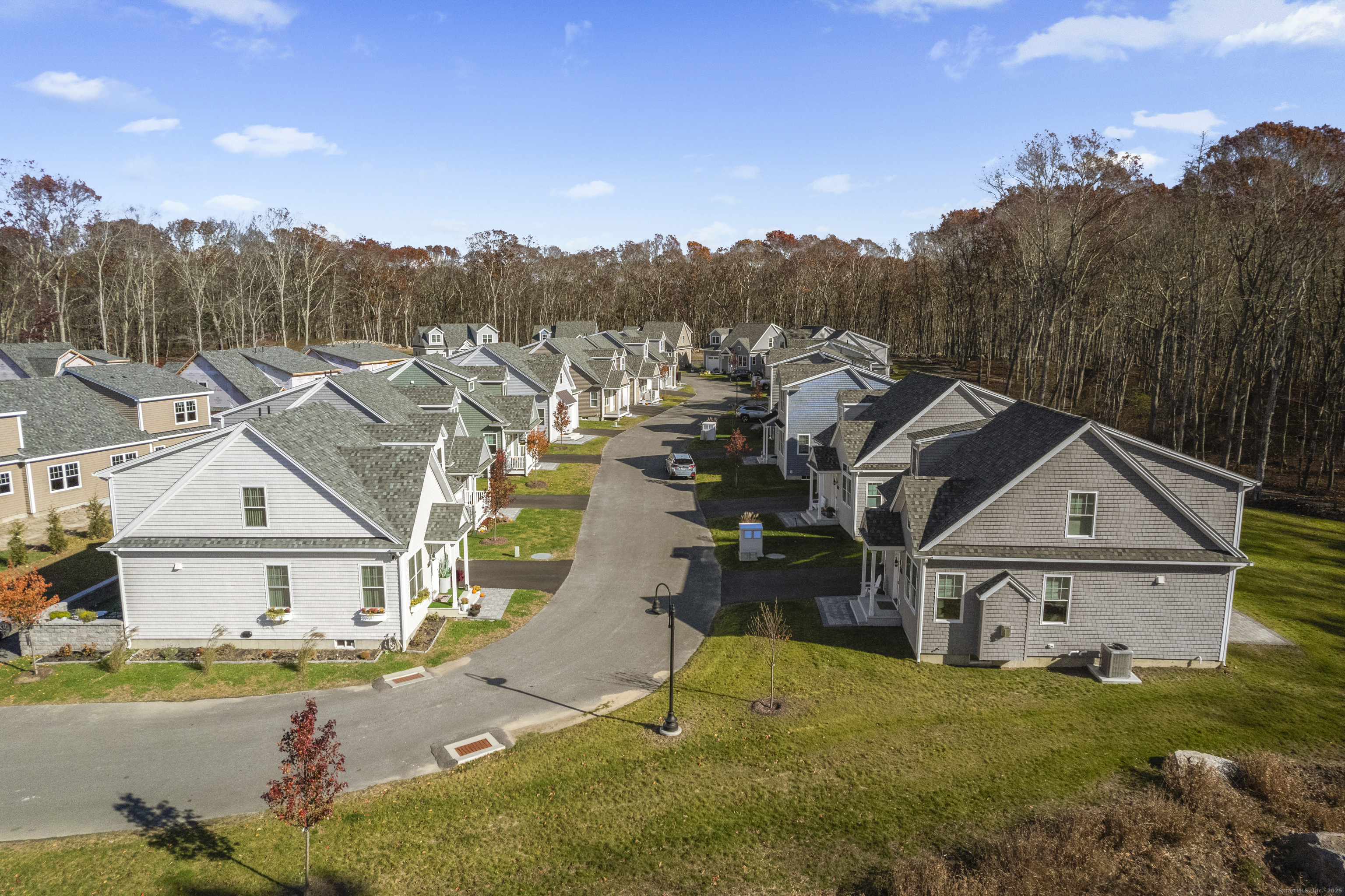 11 Ivy Hill Road, Unit 11 Ridgefield, CT 06877 - Photo 6 of 8 an aerial view of a house