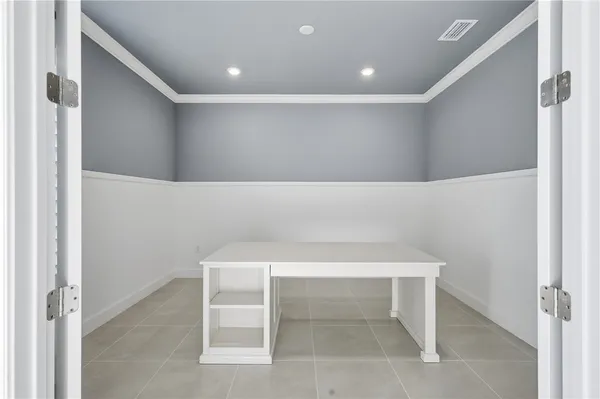 a room with a table and chairs