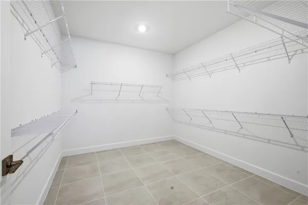 a view of a room with racks on the wall