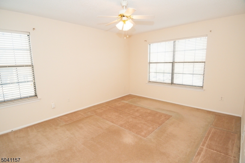 48 Taylor Road Franklin, NJ 07416 - Photo 16 of 25 an empty room with windows and fan