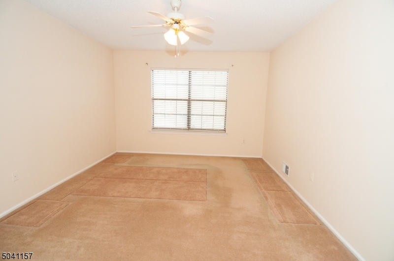 48 Taylor Road Franklin, NJ 07416 - Photo 17 of 25 an empty room with a window