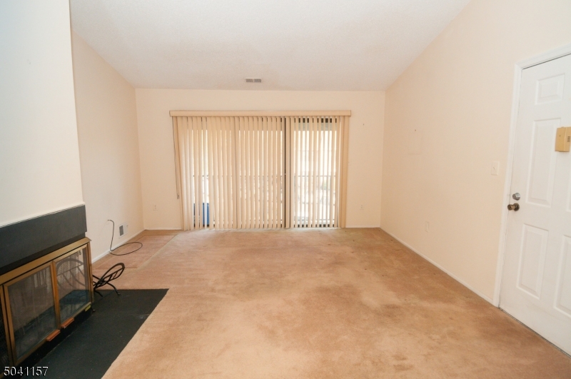 48 Taylor Road Franklin, NJ 07416 - Photo 3 of 25 an empty room with windows
