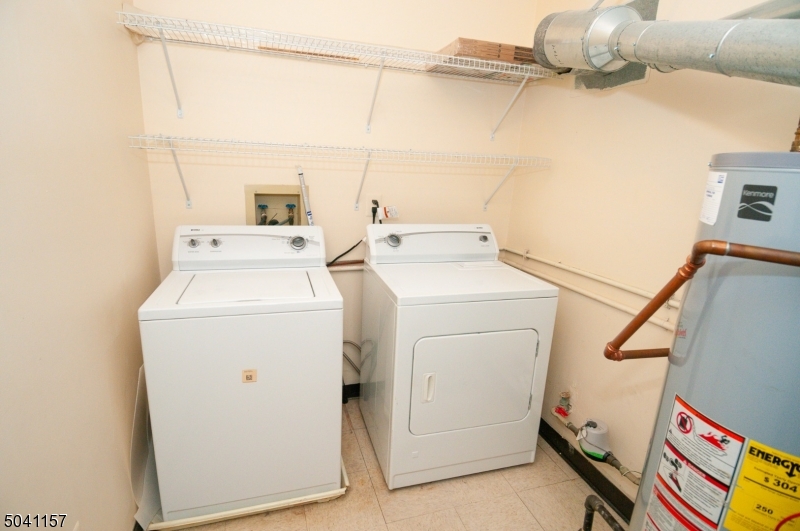 48 Taylor Road Franklin, NJ 07416 - Photo 22 of 25 a utility room with dryer and washer