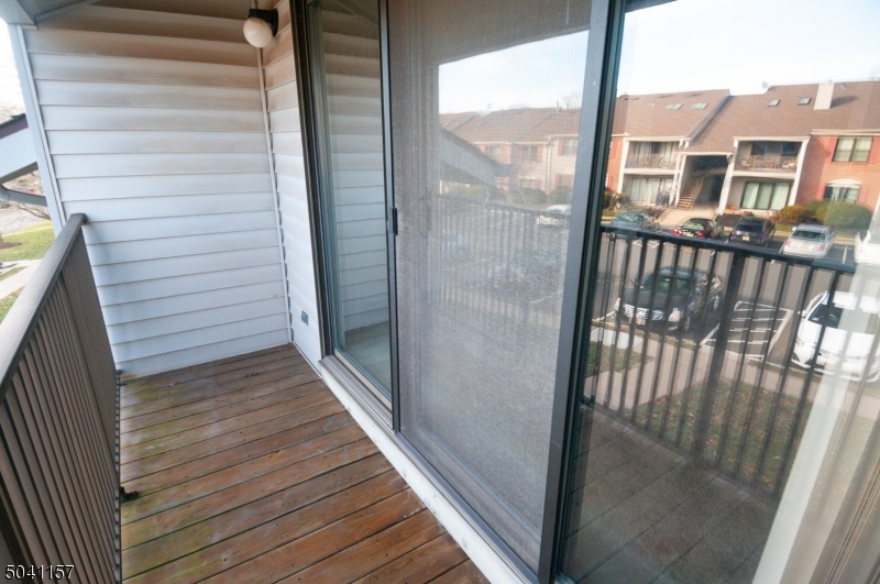 48 Taylor Road Franklin, NJ 07416 - Photo 23 of 25 a view of a balcony with wooden floor