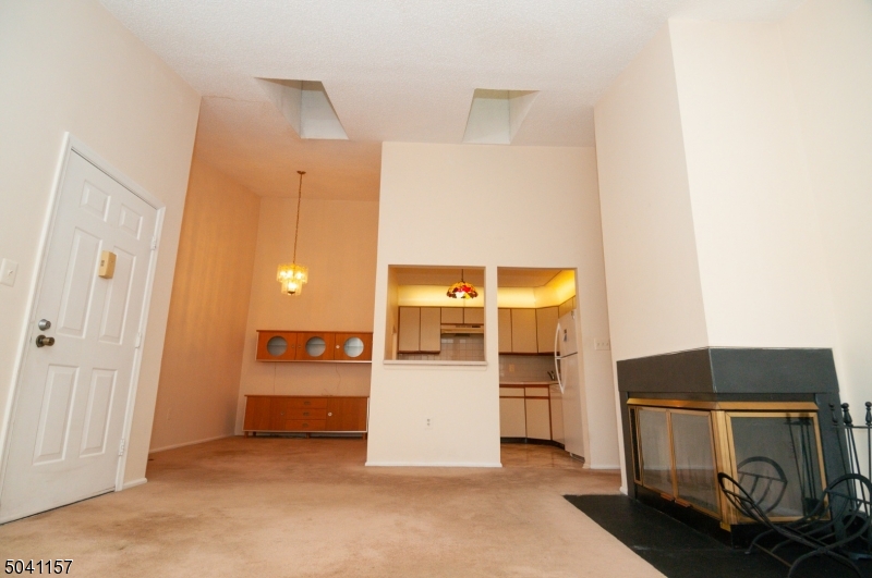 48 Taylor Road Franklin, NJ 07416 - Photo 5 of 25 a kitchen with a refrigerator and a stove