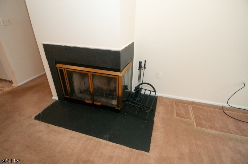 48 Taylor Road Franklin, NJ 07416 - Photo 6 of 25 a view of an empty room with wooden floor