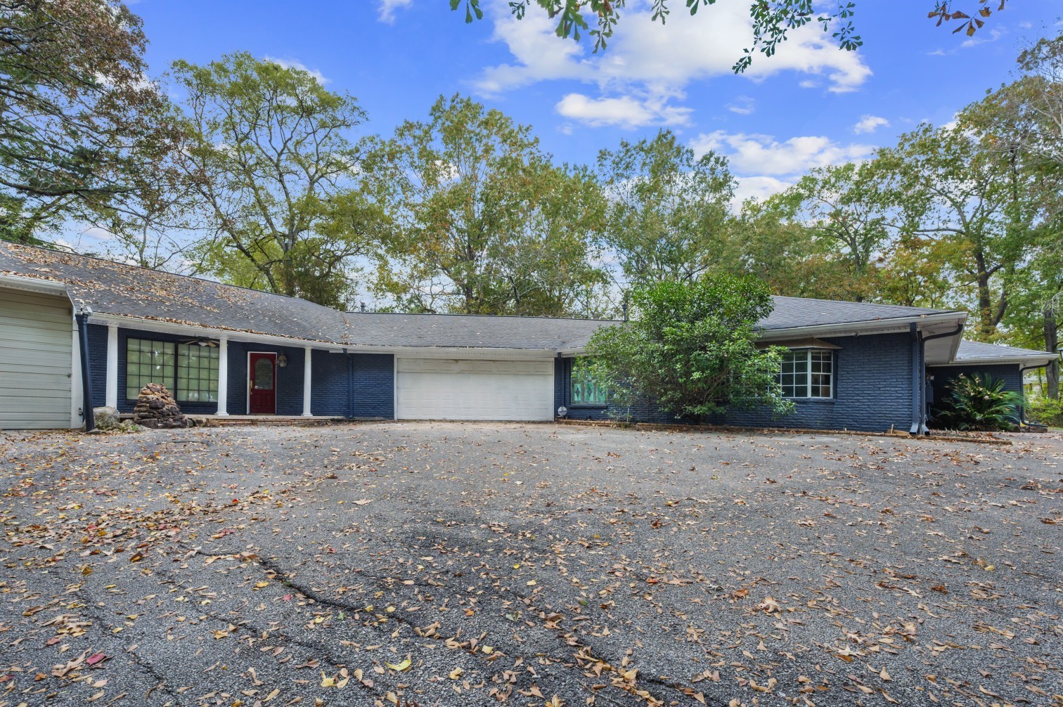 1207 Glade Street Lufkin, TX 75901 - Photo 29 of 49 front view of a house with a street